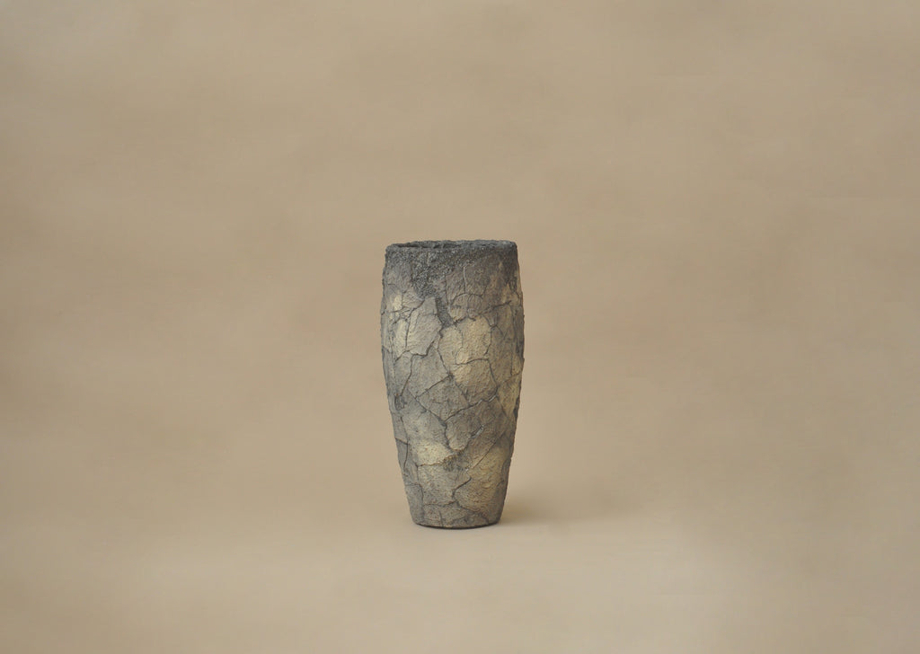 Textured vase on a beige background